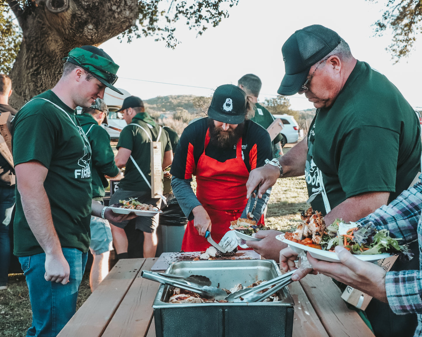 Corbin slices up tri tip to serve to guests during an on-site catering event. 